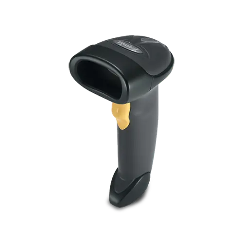 Barcode scanner on a desk with a barcode in the background.